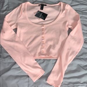 Baby pink top with lulu bag and body mousse